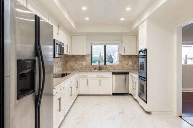 1 habitación, 2 baños, 1,579 pies cuadrados, cocina - Maple Drive Apartments