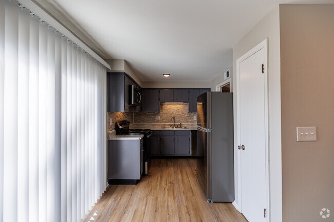 2 BR, 1.5 BA - 1,102 SF - Townhouse - Flowerdale Apartments
