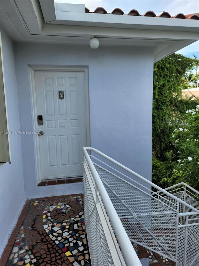 Building Photo - 210  Mendoza Ave  6 Coral Gables Fl 33134