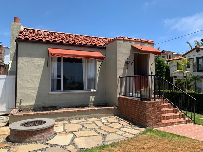 Front exterior with dutch door, planter to be landscaped before move in - 1702 Golden Ave