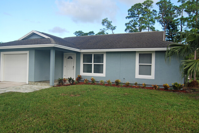 Building Photo - 6279 SE Poinciana Ln