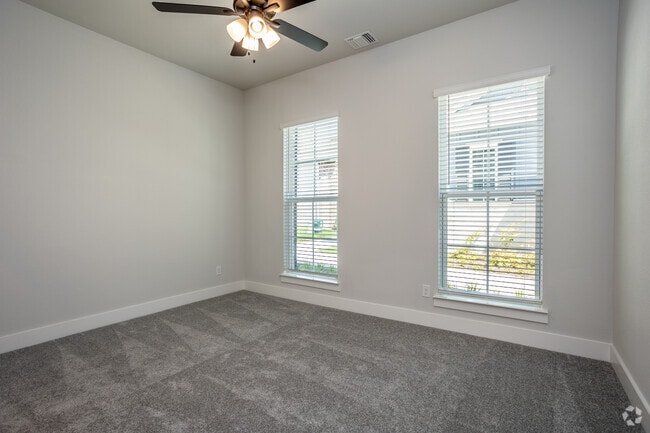 3BR, 2BA - 1,369SF - Primary Bedroom - Canopy Homes at Woodcreek