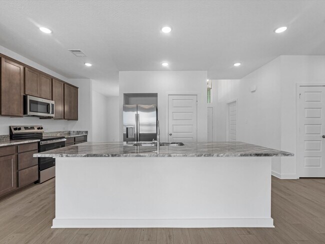 Foto del edificio - 10602 Burgundy Berry Wy