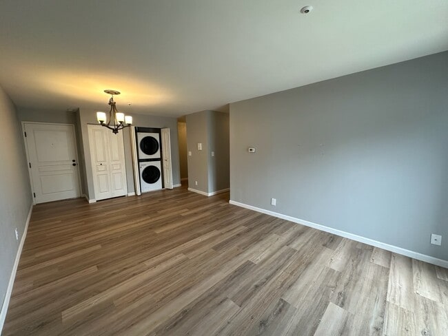 LIVING ROOM with LVP Flooring, New Paint & Lighting - 12765 W Hampton Ave