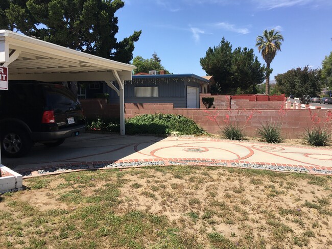 Artistic driveway with wheelchair ramp at door - 9209 Swinton Ave