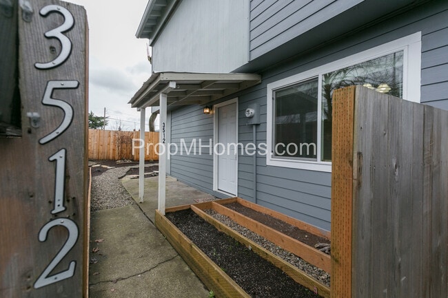 Building Photo - Discover Modern Comforts & Garden Serenity in Foster-Powell!