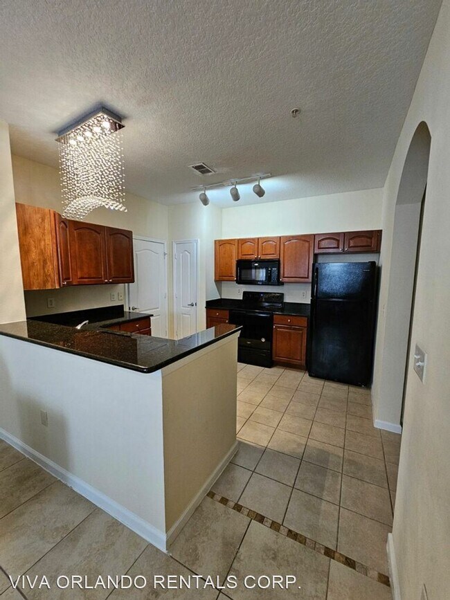 Building Photo - 2 br, 2 bath House - 5253 CANE ISLAND LP #204