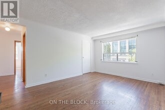 Building Photo - 883 St Clair Ave W