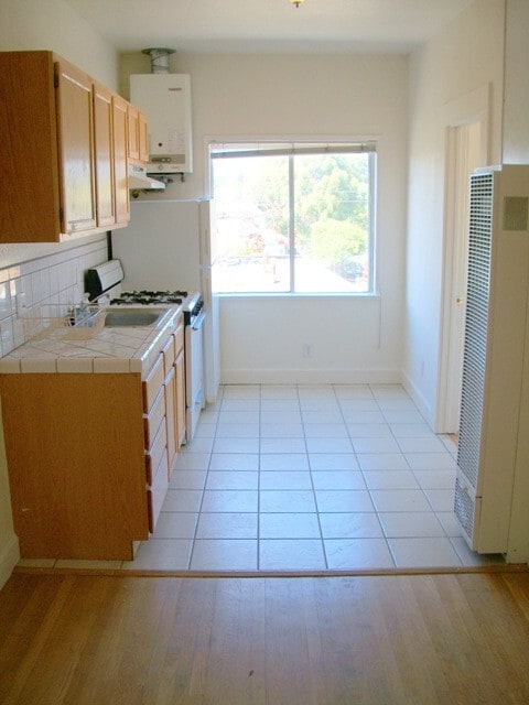 Primary Photo - Newly Remodeled corner unit small 2-bedroo...
