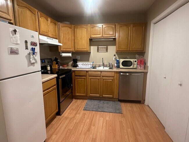Kitchen, door on right is W&D hookup - 126 Kesterson St