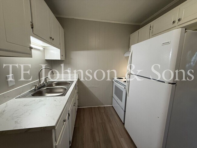 Foto del edificio - Cozy 1-Bedroom with Water Included