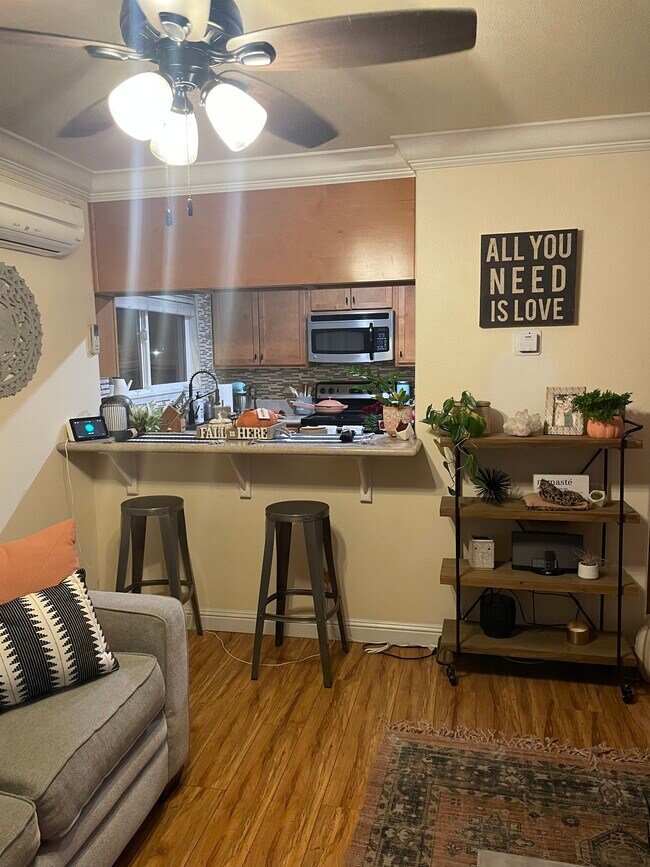 Living room looking into kitchen - 225 Burt St