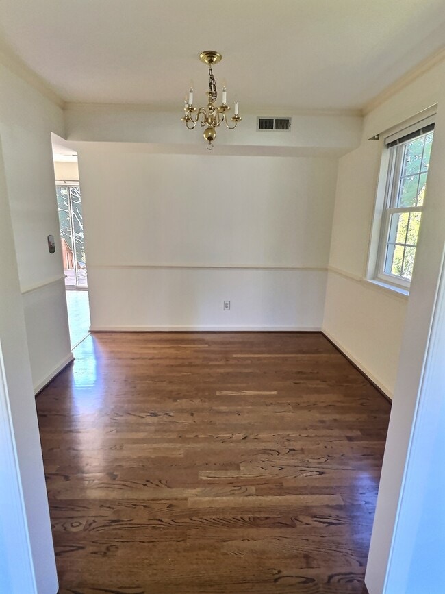 Dining room adjoins kitchen & eat in dining area - 69 Court Pl