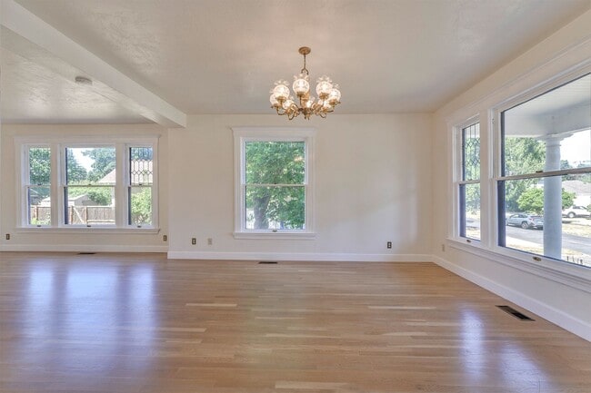 Building Photo - Historic Elegance Meets Modern Comfort – Beautifully Restored 1904 Victorian in the Heart of Fore...
