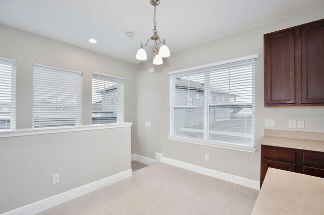 Foto del edificio - *Unfurnished* Beautiful 1/1 Spacious Garage Apartment in the Exclusive Laureate Park - Orlando!