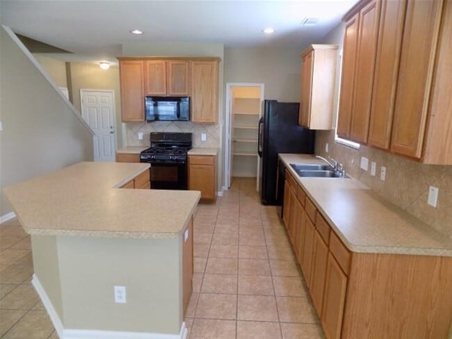 Building Photo - 12919 Palm Leaf Ct
