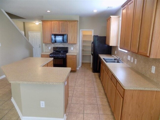 Foto del edificio - 12919 Palm Leaf Ct