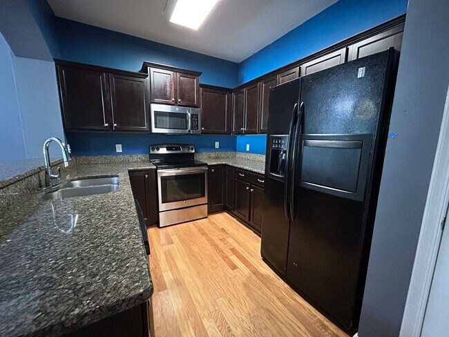 Building Photo - Welcome to this charming Condo! “ASK ABOUT...