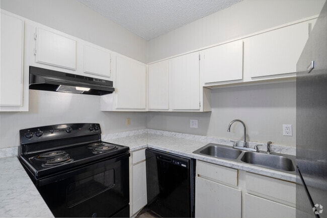 Kitchen - Camelot Apartments and Townhomes