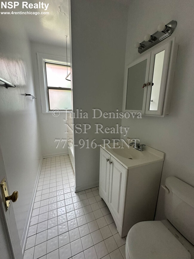 Building Photo - 1369 W Estes Ave