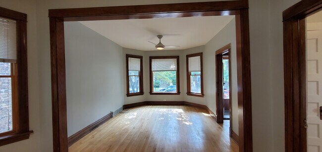 Living Rm w high ceilings, large windows & fan - 3655 N Janssen Ave