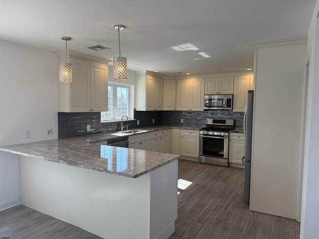 Foto del edificio - 101 W Beach Ave