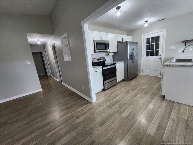 Building Photo - 2212 Mossycup Ln