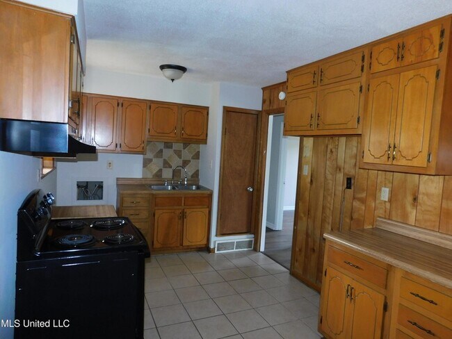 Foto del edificio - 7858 Cherry Valley Blvd