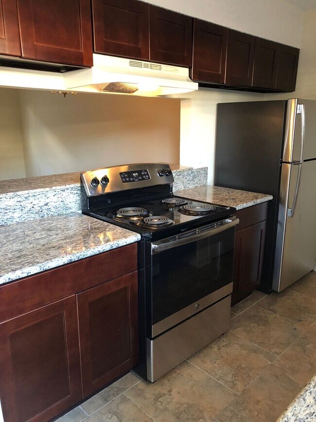 Building Photo - Renovated two bedroom available. Waiting f...