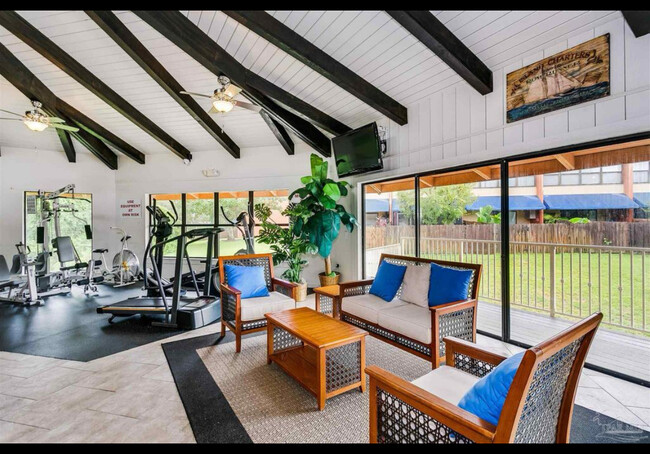 Club room for your enjoyment with workout area and sauna - 201 Pensacola Beach Rd