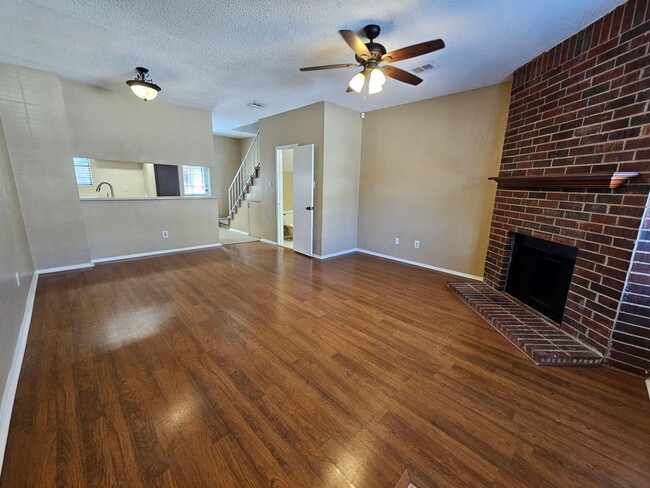 Building Photo - Stunning two-level, two-bedroom, one-and-a-half-bathroom townhome