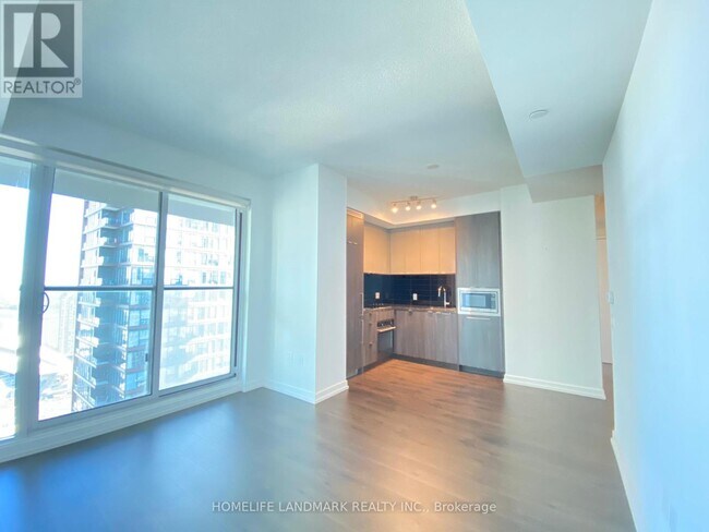 Photo du bâtiment - 125-4125 Blue Jays Way