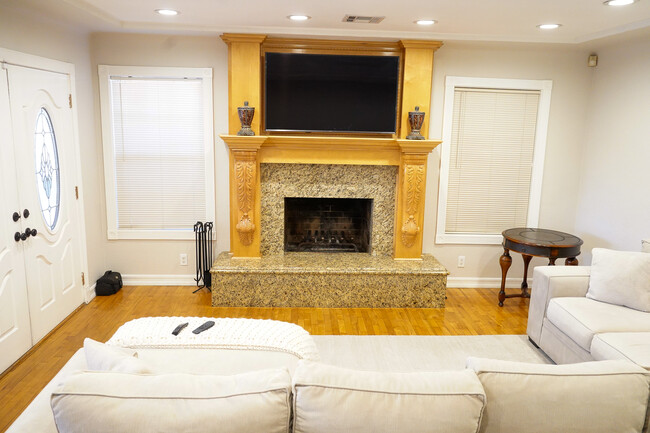 Living Room with Grandfathered Fireplace - 2545 Iowa Ave