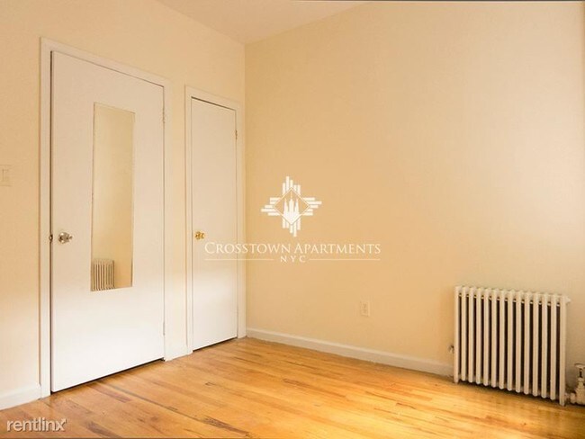 Foto del edificio - 209 E 3rd St