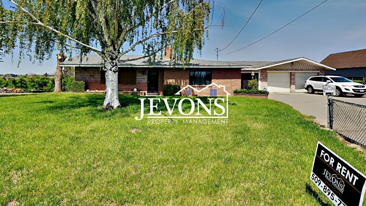 Foto principal - Inviting 2-bedroom with a fully fenced lar...