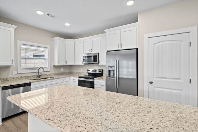 Building Photo - READY NOW! NEWLY CONSTRUCTED DUPLEX!
