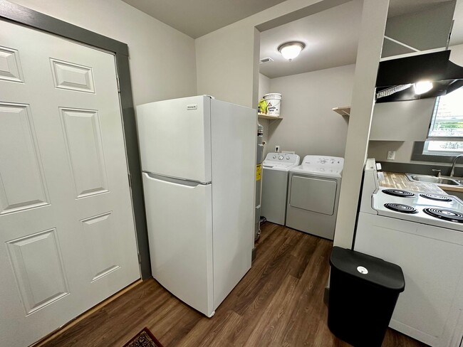 Building Photo - New Construction-Fully Furnished & Utiliti...