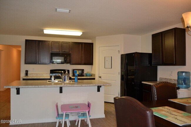 Foto del edificio - 7106 Riverbrooke St