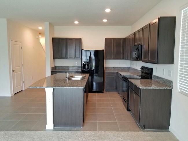 Building Photo - 6917 Breezy Palm