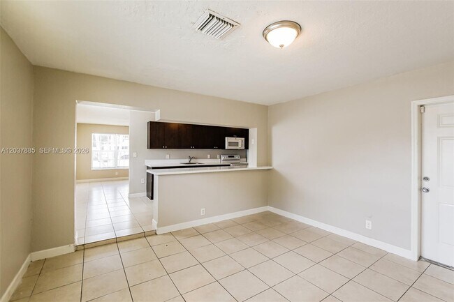 Building Photo - 5980 NW 24th Ct