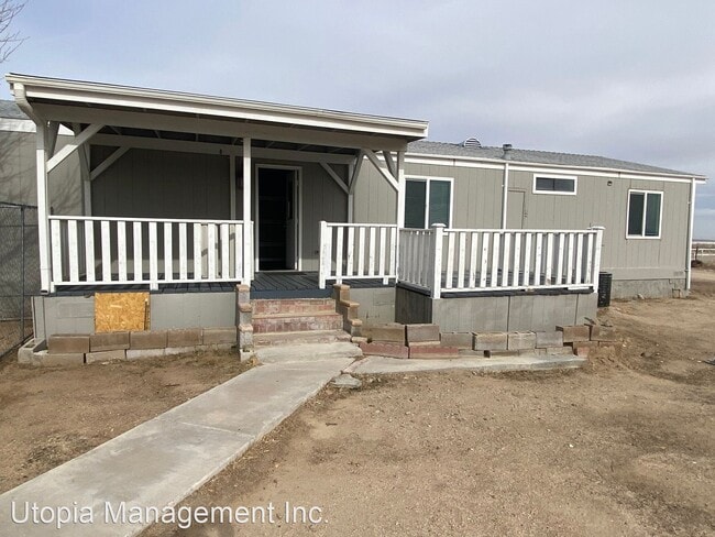 Building Photo - 3 br, 2 bath House - 7824 W. Ave. E14