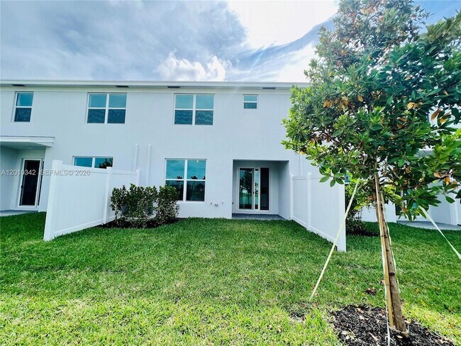 Foto del edificio - 6909 Harbours Edge Ave