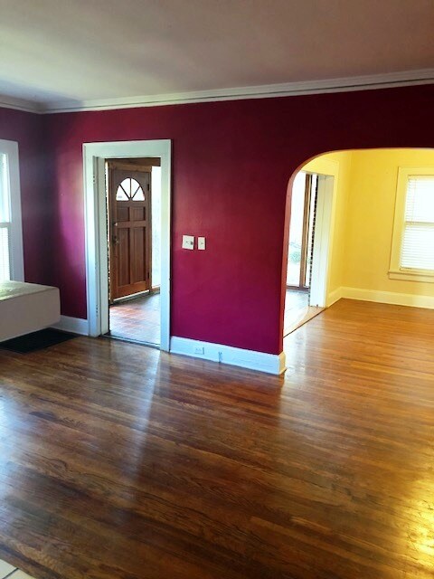 Living room into dining room & front - 829 Courtenay Dr NE