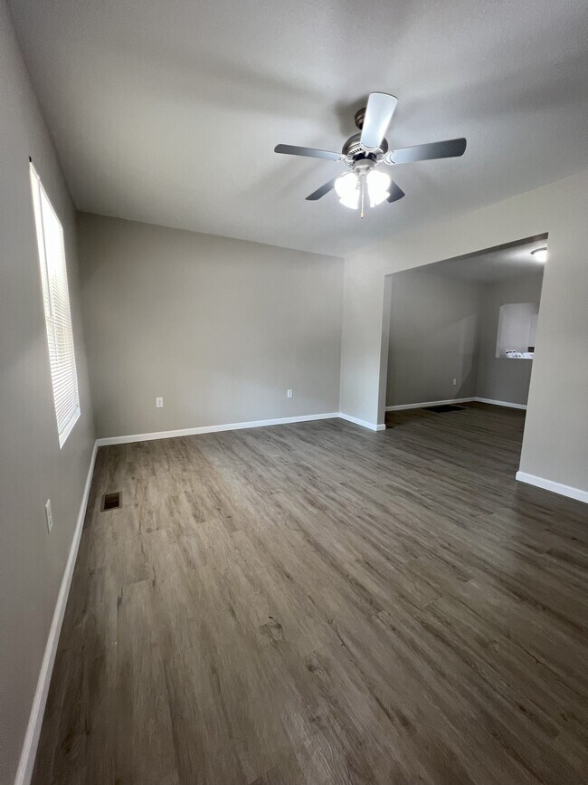 Front Living Room - Enter into directly from the front door. - 706 W State St