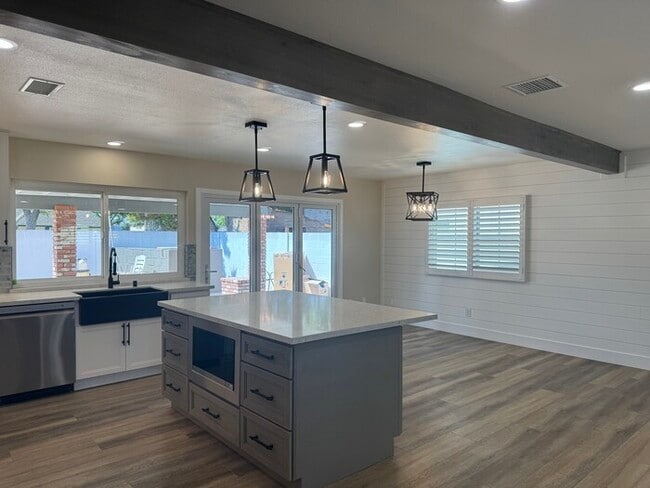 Building Photo - Brand New Remodel – Stunning Pool Home wit...