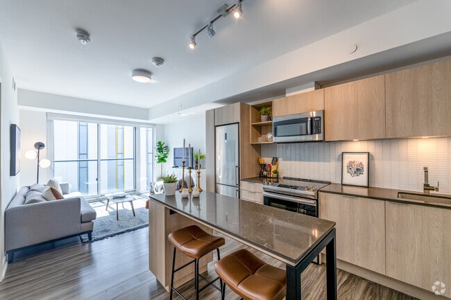 2BR, 2BA - 832 SF - Kitchen/Living Room - 77 & 99 Gerrard West Apartments