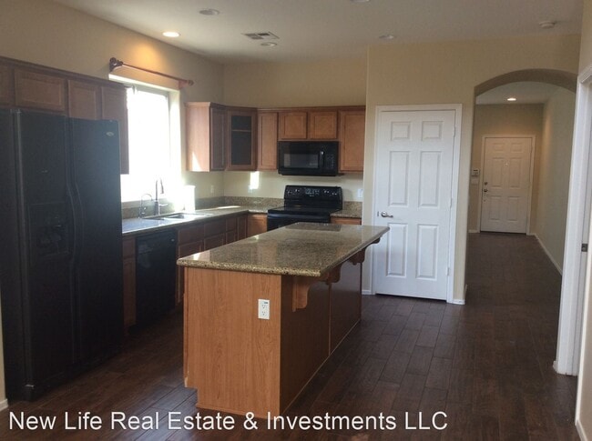Building Photo - 4 br, 2.5 bath House - 44151 W Palmen Dr
