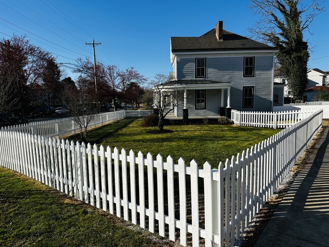 Newly built perimeter gated fence on large corner lot. - 1358 Rivermont Ave