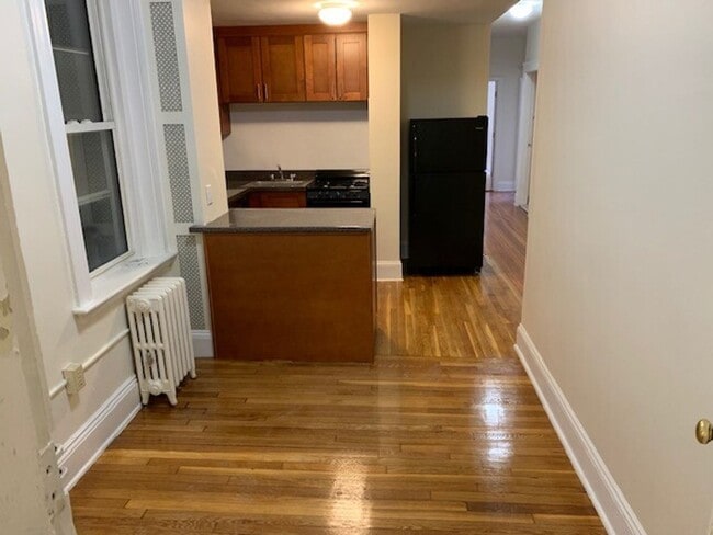 Building Photo - No Brokers Fee, No Security Deposit, Heat Hot Water Included, Laundry on a Site, Steps from the T...
