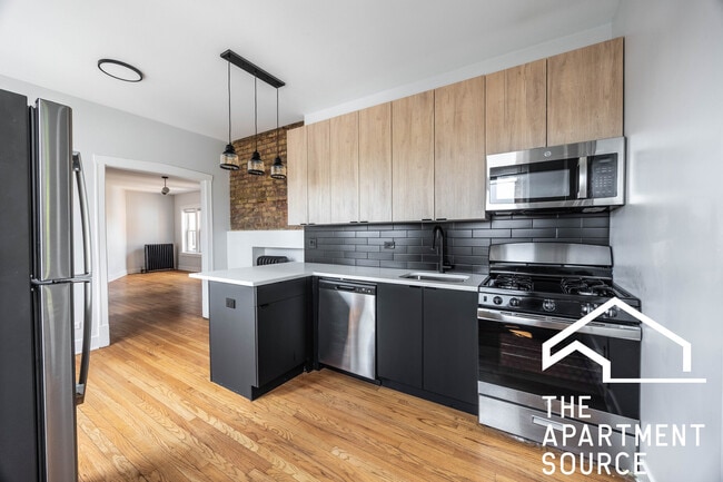 Building Photo - 4011-A North Lowell Ave. Unit 3W